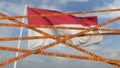 Do not cross biohazard tape lines on the Indonesian flag background. Restricted entry or quarantine in Indonesia