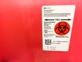 Biohazard sharps needle syringe red container Royalty Free Stock Photo