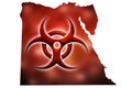 Biohazard sign against the background of a contour map of Egypt with a red glow. The concept of a new outbreak of diseases and