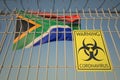 Coronavirus biohazard sign with flag of South Africa as a background. South African medical quarantine, conceptual 3D