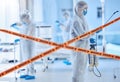 Biohazard team cleaning a hospital room. Science colleagues santise a hospital together. Medical team using antiseptic Royalty Free Stock Photo