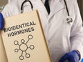 Bioidentical hormones are shown using the text in the book Royalty Free Stock Photo