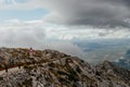 Biokovo. Mountain landscape with low clouds. Warning road sign with exclamation mark and 30 mph speed limit sign. Croatia Royalty Free Stock Photo