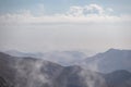 Biokovo - Panoramic view of mystical fog covered mountain ranges of Biokovo nature park near Makarska, Dalmatia, Croatia Royalty Free Stock Photo