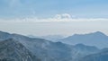 Biokovo - Panoramic view of mystical fog covered mountain ranges of Biokovo nature park near Makarska, Dalmatia, Croatia Royalty Free Stock Photo