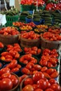 Biologic, natural cultivated tomatoes on a market counter Royalty Free Stock Photo