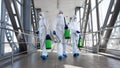 Men in a protective suit and mask disinfecting tunnel with gas Royalty Free Stock Photo