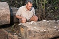 Biologist inspecting fungus growing