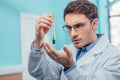 Biologist with plant in flask Royalty Free Stock Photo