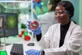 Biologist researcher looking at plant based beef substitute for vegetarien people Royalty Free Stock Photo