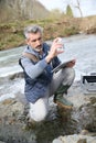 Biologist testing water quality of river Royalty Free Stock Photo