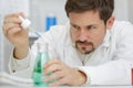 Biologist working in petri dishes in lab Royalty Free Stock Photo