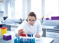 Biologist working with test tubes