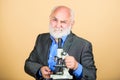 Biology education. science lab. chemistry in school laboratory. mature bearded teacher with microscope. senior man Royalty Free Stock Photo