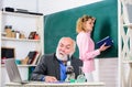 Biology science. Student study. Educator and student classroom. Girl with notepad near chalkboard. College university Royalty Free Stock Photo