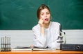 Biology student sit classroom chalkboard background. Education concept. Woman pretty adorable teacher or student