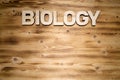 BIOLOGY word made of wooden block letters on wooden board. Royalty Free Stock Photo