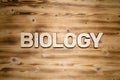 BIOLOGY word made of wooden block letters on wooden board Royalty Free Stock Photo