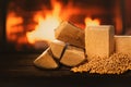 biomass heating. firewood, pellets and briquettes on wood burning fireplace background. sustainable, carbon neutral and renewable
