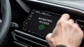 Biometric access system displayed on vehicle dashboard, enhancing security