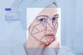 Biometric verification of a modern young woman. New technology of face recognition on polygonal grid Royalty Free Stock Photo