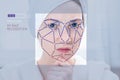 Biometric verification of a modern young woman. New technology of face recognition on polygonal grid Royalty Free Stock Photo