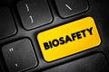 Biosafety text button on keyboard, concept background