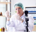 Biotechnology concept with scientist in lab Royalty Free Stock Photo