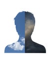 Bipolar disorder. Concept of mental illness. Silhouette of man with half clear sky and half stormy sky Royalty Free Stock Photo