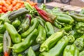 Fresh green chilis for sale at the outdoor souk in Bir al Haffay Royalty Free Stock Photo