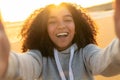 Biracial African American Girl Teenager Selfie on Beach at Sunset Royalty Free Stock Photo