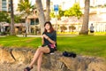 Teenage female tourist eating Hawaiian musubi in Waikiki, Honolulu, Hawaii Royalty Free Stock Photo