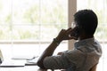 Biracial male employee talk with client on cellphone call Royalty Free Stock Photo