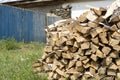 Birch firewood is stacked at night and dried in the summer. Firewood is harvested Royalty Free Stock Photo