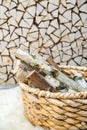 Birch firewood in the wooden basket Royalty Free Stock Photo