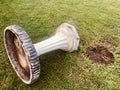 Bird bath garden columns pedestals on lawn.