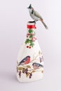 Bird on a decoupage bottle