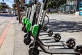 Bird Electric Ride Sharing Scooters Lined Up and Ready to Rent Royalty Free Stock Photo