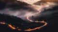 A bird eye scenery view of a winding road cutting turns through clouds of serpentine a dense forest , mountain landscape.Top Down Royalty Free Stock Photo