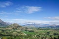 Bird eye view of cityscape in Queenstown New Zealand with mountain range in sunny blue sky