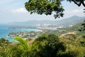 Bird eye view on Phuket island coastline. Panorama of tropical beach. Beautiful turquoise ocean waves with boats and Royalty Free Stock Photo