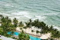 Bird eye view of white sand beach, coconut palm trees, hotels, resorts and tropical sea surf on Koh Chang island in Thailand Royalty Free Stock Photo