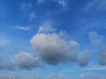 Bird flying White clouds in the blue sky cloudy natural background Royalty Free Stock Photo