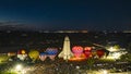 Aerial View of Hot Air Balloons Doing a Balloon Glow With a Space Shuttle at Night on a Summer Nite