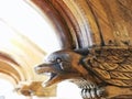 Bird head carved in wood Royalty Free Stock Photo