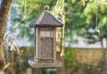 Bird house with bird feed