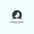 Bird logo with negative space. Black Bird standing isolated on white background. Premium vector