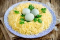 Bird nest Easter salad decorated with boiled egg yolks and cheese Royalty Free Stock Photo