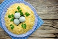 Bird nest Easter salad decorated with boiled egg yolks and cheese Royalty Free Stock Photo