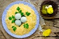 Bird nest Easter salad decorated with boiled egg yolks and cheese Royalty Free Stock Photo